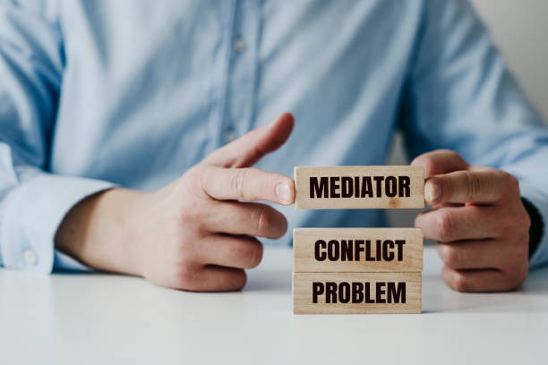 Mediator resolving conflicts.